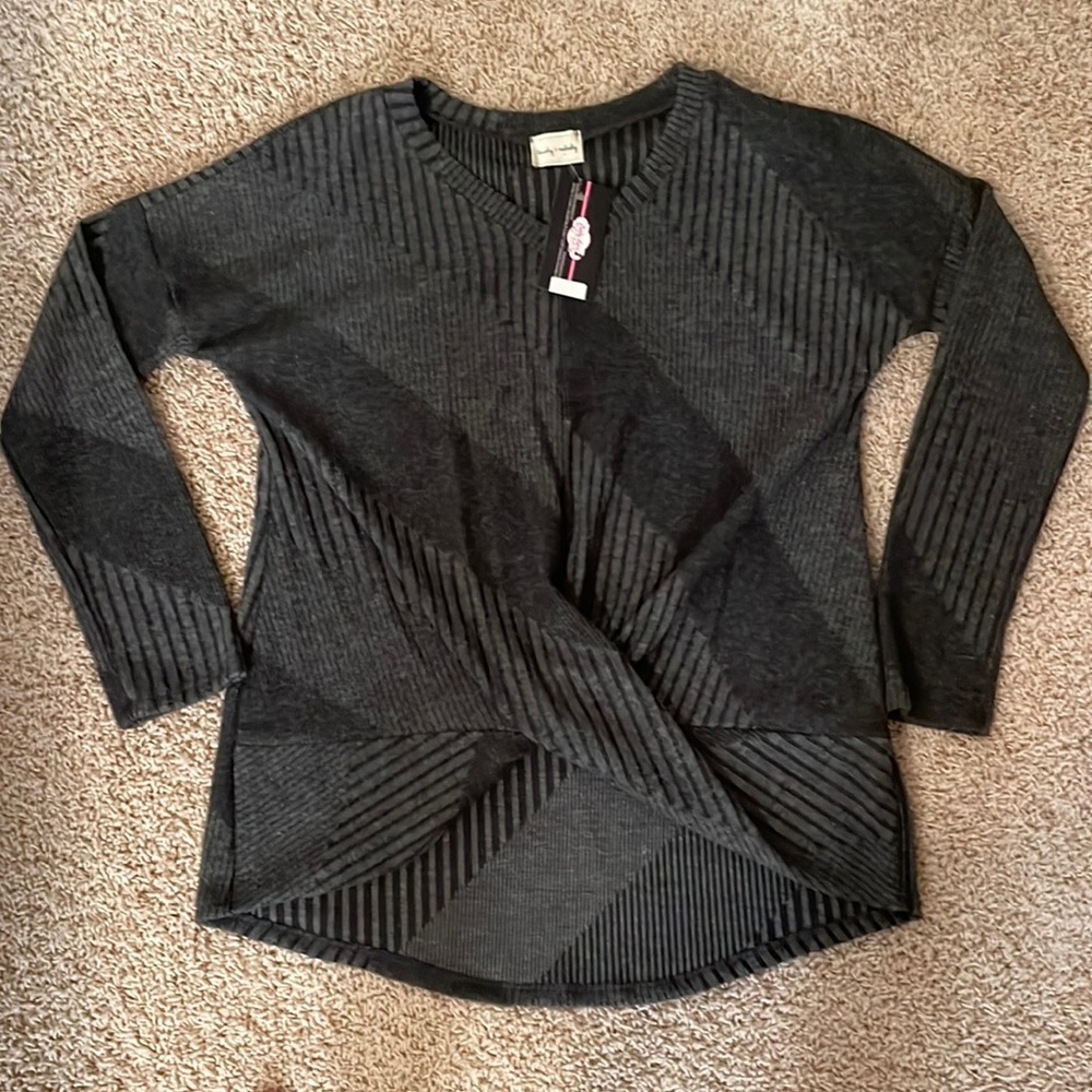 NWT soft lighter weight sweater. 95% polyester/3% Spandex. Black and grey.
